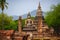 Sukhothai Wat Mahathat Buddha statues at Wat Mahathat ancient capital of Sukhothai  Thailand. Sukhothai Historical Park is the UNE