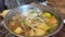 Suki Yaki, Vegetables in hot soup, Chinese style food close up. Boiling water in pot Suki