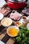 Sukiyaki . Preparation of raw materials,beef,egg ,tofu,vegetable and mung bean noodle  for sukiyaki using hot pots