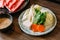 Sukiyaki vegetables set including cabbage, false pak choi, carrot, shiitake, enokitake.