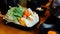 Sukiyaki vegetables set including cabbage, false pak choi, carrot, shiitake, enokitake, tofu, pumpkin, scallion and konjac noodle.