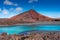 Sulfur lake in front of a volcano in Lanzarote,  Canary Islands, Spain