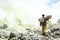 Sulfur miner in Kawah Ijen, Java, Indonesia