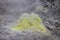 Sulphur pieces on Iozan (sulfur mountain) active volcano area, Akan National Park, Hokkaido, Japan