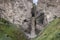 Sultan Waterfall in Kabardino-Balkaria, Russia. Close-up of a large turbulent flow of water in the river.