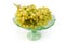 Sultana grapes cluster in vintage glass vase for fruits