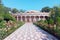 The Summer Amphitheater in the Dushanbe Botanical Garden against the blue sky on a sunny day