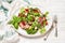 Summer arugula, prosciutto and strawberry salad