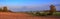Summer autumn landscape plowed field. Panoramic view. Panorama