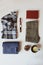 summer or autumn woman casual fashion set flat lay. Plaid shirt, blue cross body bag and khaki pants