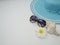 Summer background. Shells, straw hats, sunglasses