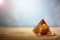 Summer beach background concept,  pyramid on the beach in summer. Summer background. Tropical sandy beach. toned