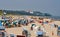 Summer beach many people with tents