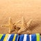 Summer beach sand starfish standing border square