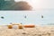 Summer beach swim ring inner tube on the beach with blurred swimmer on the sea. tropical beach landscape for background