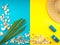 Summer Beach Travel concept. Palm Tree Leaf, straw hat, seashell, blue car on yellow background