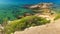 Summer beach with turquoise water. Spanish beach in mediterranean sea, Costa Brava, Spain. Rocks on sandy beach