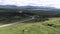 Summer beautiful nature from a drone. Scenes. A beautiful landscape with beautiful mountains , a green forest, a road on