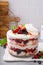 Summer berry trifle with angel food cake in a large bowl