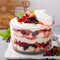 Summer berry trifle with angel food cake in a large bowl