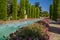 Summer blooms line ornamental pools in Cordoba, Spain
