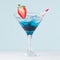 Summer blue alcohol cocktail with curacao  with strawberry red straw on light pastel green background and white wood table, square