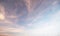 Summer Blue Sky and white clouds background. Beautiful clear cloudy in sunlight spring season. Panorama vivid cyan cloudscape in