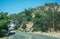 Summer in California. Cars on a highway in a rural area in Sierra Nevada