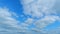 Summer clouds. Puffy fluffy white clouds. Time lapse.