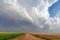 Summer cloudscape with cumulonimbus clouds over a field in Kansas