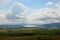 Summer cloudy landscape of fields and settlements near Orava river dam, viewe from Grapa hill near Klin village