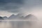 Summer cloudy Lofoten islands. Norway misty fjords.