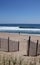 Summer is coming, lone bather and trail to beach New Jersey shore, Island Beach State Park, USA