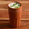 Summer cooler Buttermilk drink. Made of yogurt. served in a traditional clay pot, selective focus on top