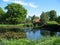 Summer country landscape with pond