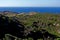 Summer: a cove cliff of cape of the Crosses in Spain with blue sea