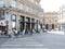 Summer crowd walks in front of Hotel du Louvre, Paris