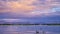 Summer dawn over Boyd Lake and Front Range of Rocky Mountains