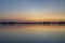 Summer dawn over a calm lake