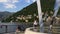 Summer day como lake famous pier life electric monument 4k italy