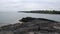 On a summer day, the Irish coastline is a study in contrasts - the waters of the ocean meet sharply-defined crags along the shore