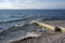 Summer day on stone beach in Izola town in Slovenia