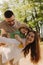 Summer day for a young family, dad, mom and little son became joyful and happy. Happy family concept photo. No focus blurred and