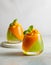 Summer dessert with exotic fruits. Mango, papaya, passion fruit and kiwi jelly dessert in glass
