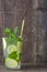 Summer drink. Fresh mojito. rustic wood