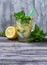 Summer drink mojito with mint, lemon and ice