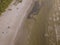 Summer evening, coastline, deserted beach of the Gulf of Riga. Sandy beach and waves. Photo from a drone