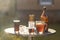 Summer evening. Colored drinks in various glassware on the outdoor table, a party in the backyard house with cold drinks, A set