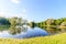 Summer evening in the Park with a lake. Summer landscape. nature of Russia. Well-maintained Park. Evening smoothness. The