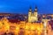 Summer evening twilight aerial panorama of the illuminated Old Town Square and Church of Our Lady Tyn in Prague, Czech Republic